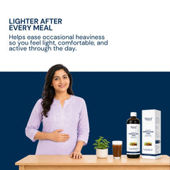 A woman in a light purple kurta stands behind a table displaying a bottle and box of Triphal Digesto Care Juice, with a glass of the dark liquid beside it. The top half of the image has a white background with blue text reading 'LIGHTER AFTER EVERY MEAL' and a benefit statement.