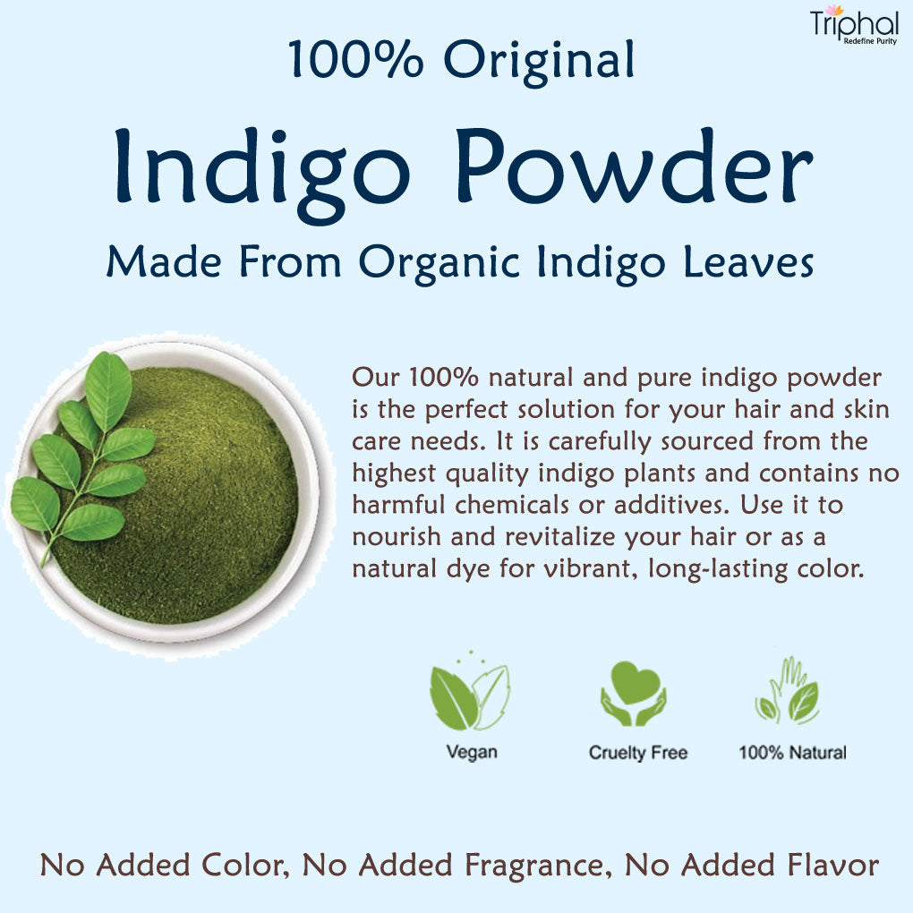 "Organic Indigo Powder for Natural Hair Coloring - Chemical-Free and Plant-Based Solution" - Close-up of Indigofera tinctoria powder in a wooden bowl and indigo leaves in the background.